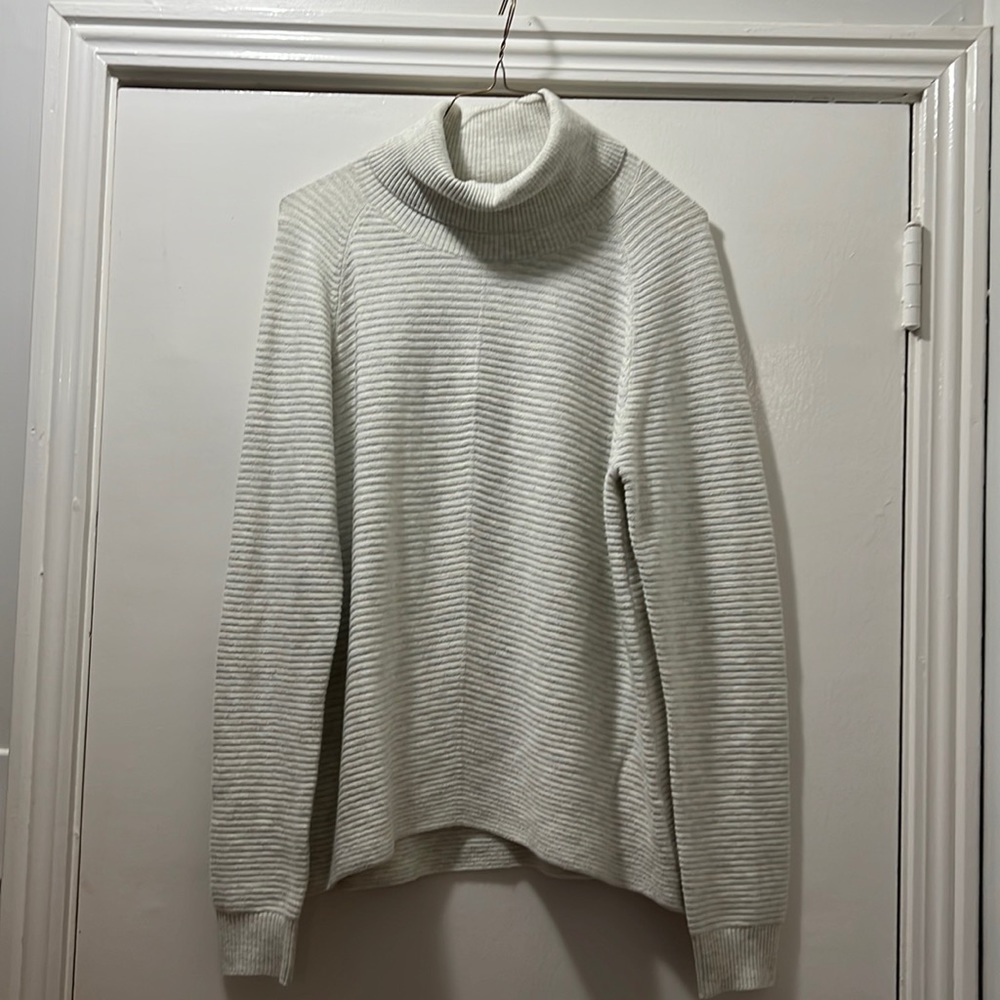 Kuhl cream turtle neck sweater never been worn size medium